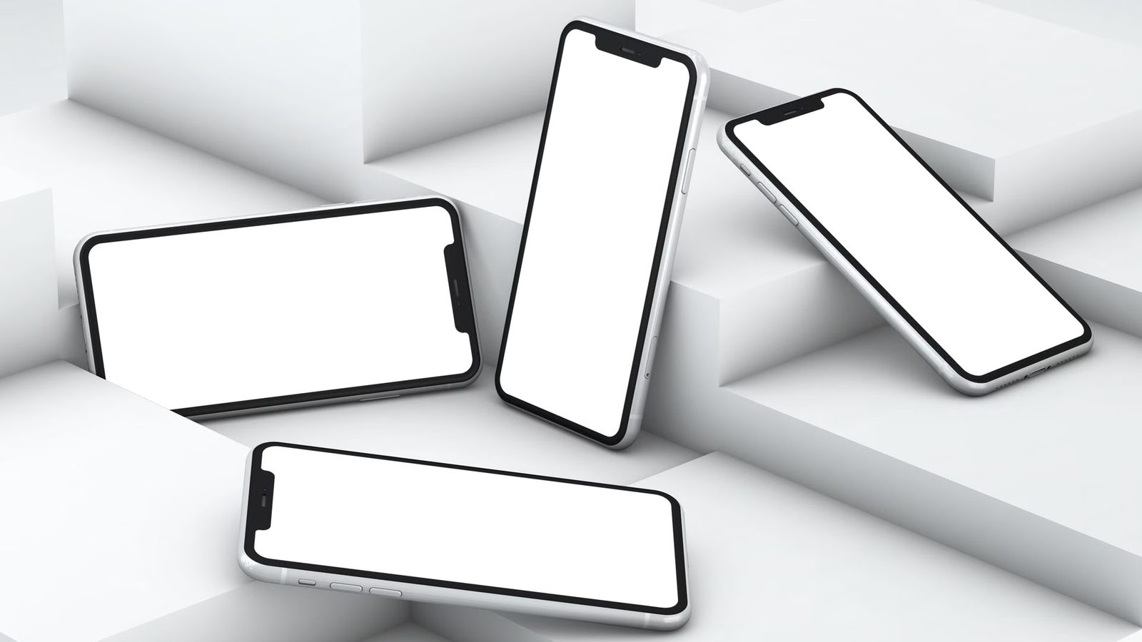 Kilka telefonów na biurku z aplikacjami